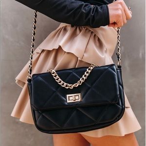 Black quilted crossbody/handbag with gold accents 🔻